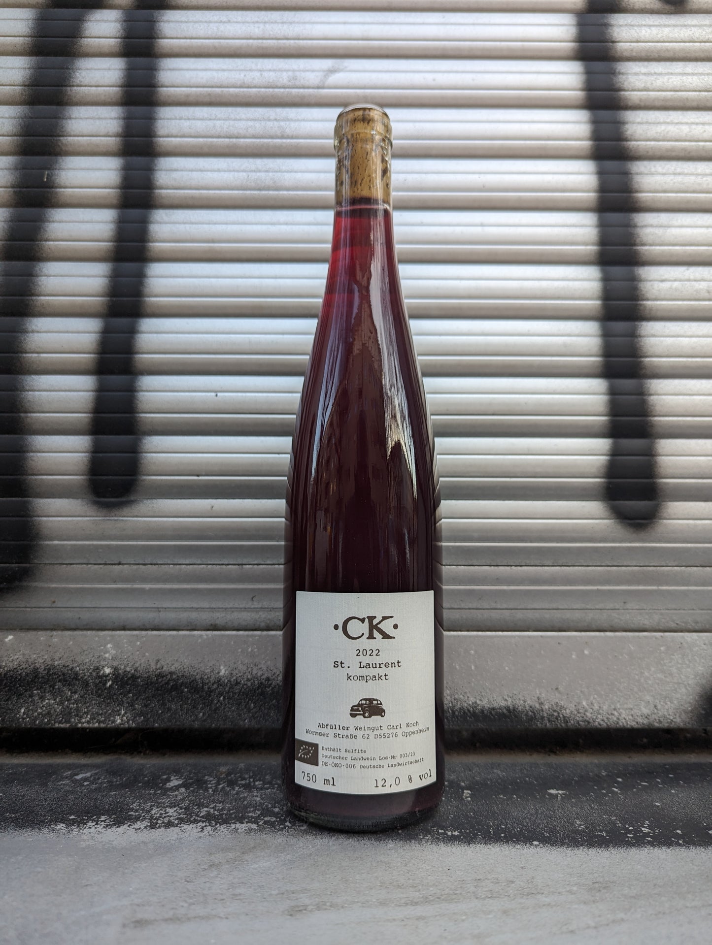 freakofnature-wine-carl-koch-st-laurent-kompakt-red-wine-bottle-white-label-graffiti